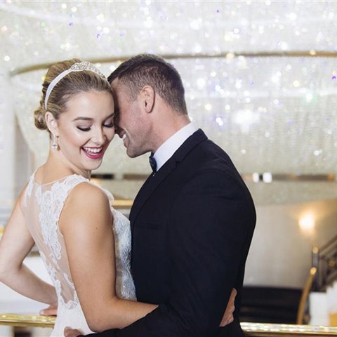 Winter Weddings - Bride and Groom at Chandelier