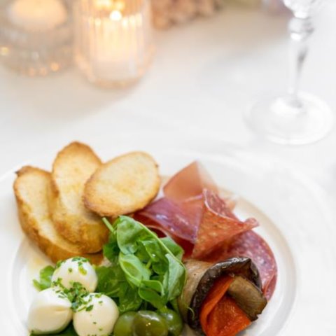 ANTIPASTO PLATESalami, Prosciutto, Olives, Roasted Vegetables, Bocconcini, Crostini