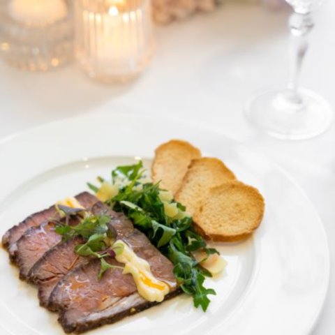 SPICED SEARED BEEF CARPACCIOSpiced Marinated Seared Beef with Rocket, Aioli and Grana Padano
