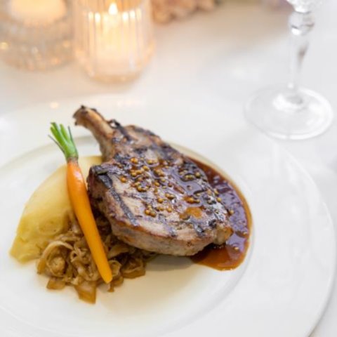 GRILLED PORK CUTLETSous Vide and Grilled Pork Cutlet with Braised Cabbage, Baby Carrot, Potato Puree and Mustard Jus (GF, NF, DF)
